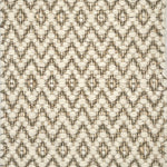 Textured flatweave rug with a diamond pattern in beige and brown tones.