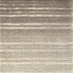 Textured rug with ombré stripes in beige and brown tones