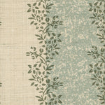 Detail of fabric in a botanical stripe print in shades of blue and dark green on a cream field.