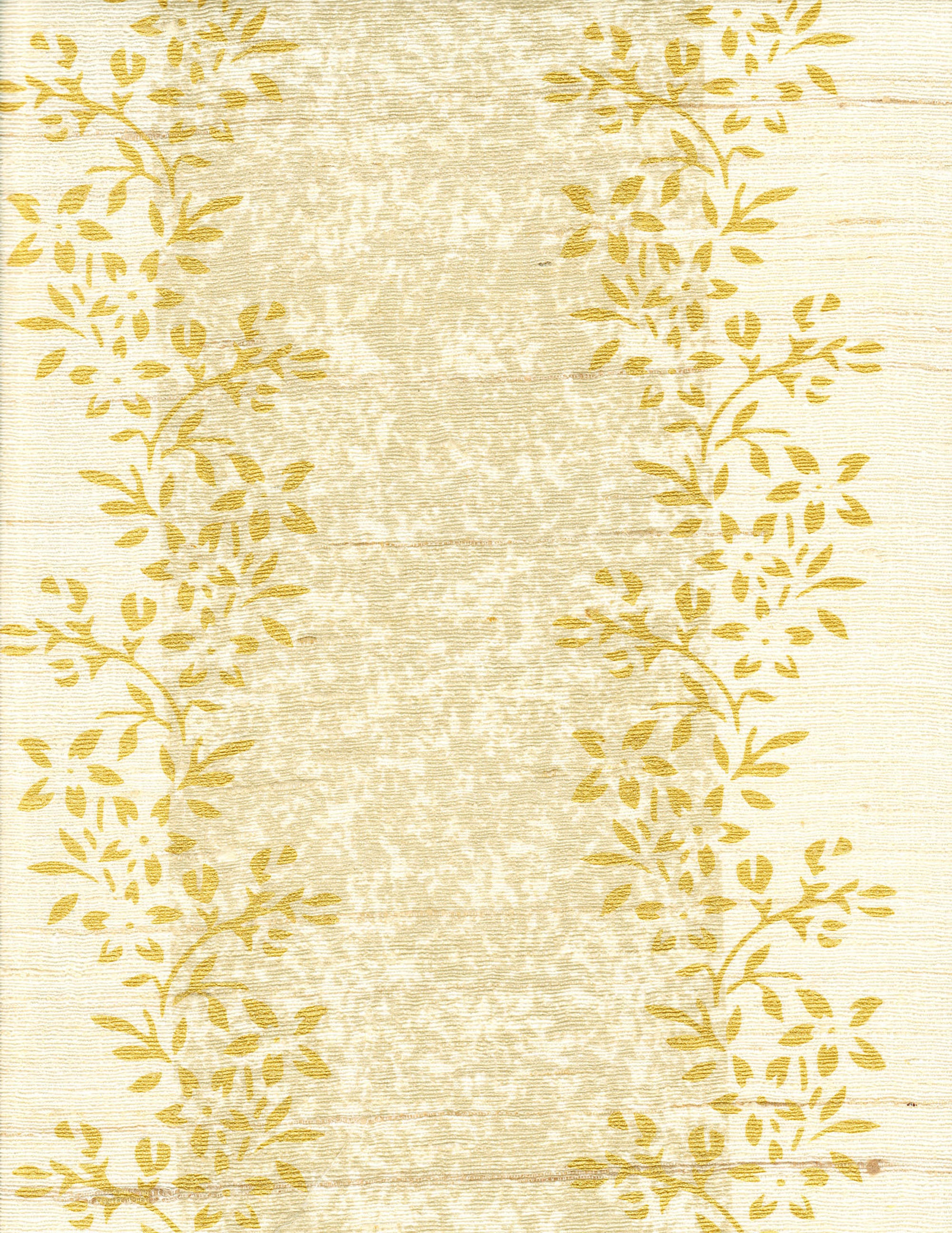 Detail of fabric in a botanical stripe print in shades of tan and yellow on a cream field.