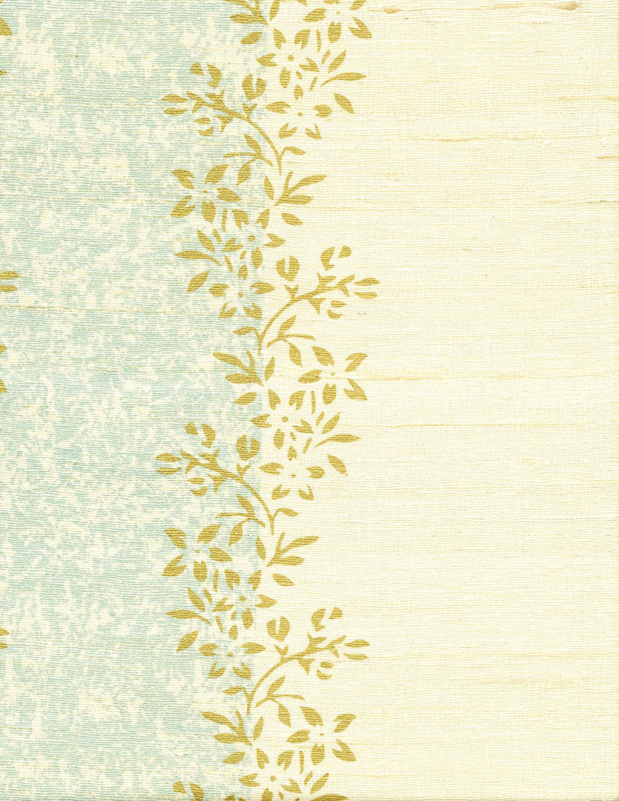 Detail of fabric in a botanical stripe print in shades of blue and yellow on a cream field.