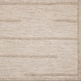 Beige woven texture rug with a subtle pattern