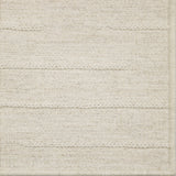 Close-up of a textured broadloom carpet with horizontal lines