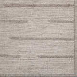 Textured rug with horizontal stripes in neutral colors