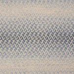 Textural broadloom with an ombré stripe in blue and cream. 