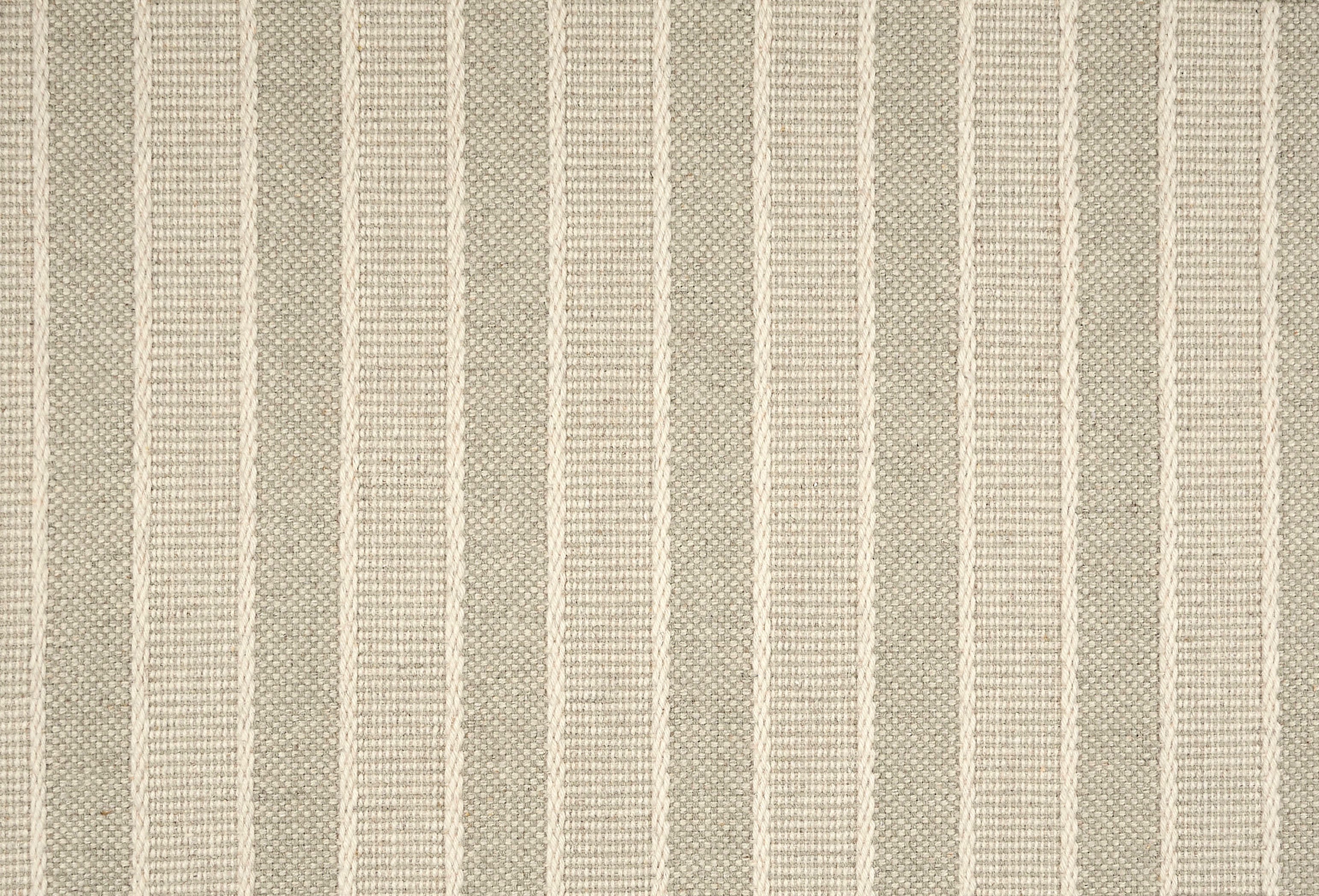 Broadloom carpet in cream and soft green stripes.