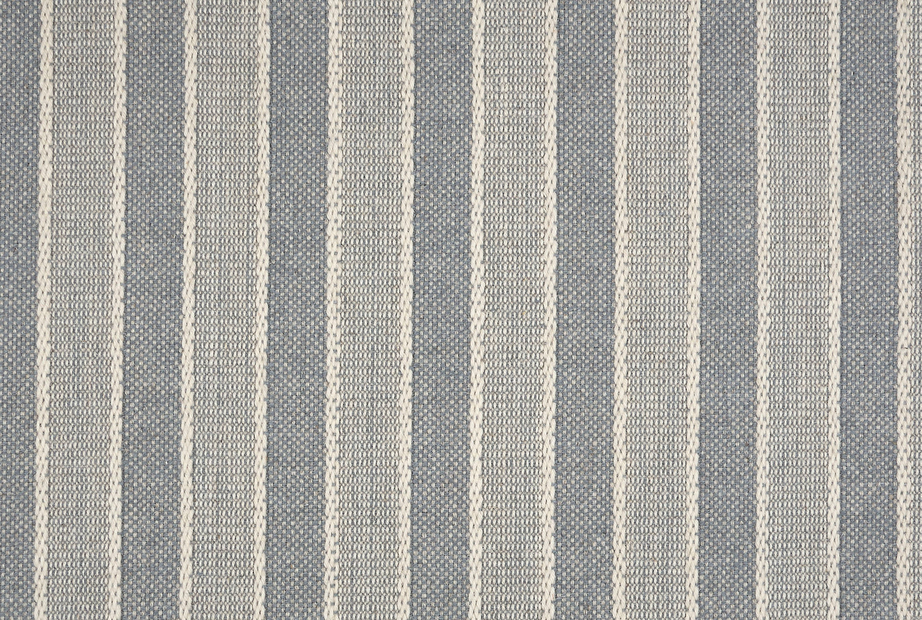 Broadloom carpet in cream and steel blue.