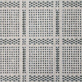 Broadloom carpet in check pattern in shades of dark green with cream. 