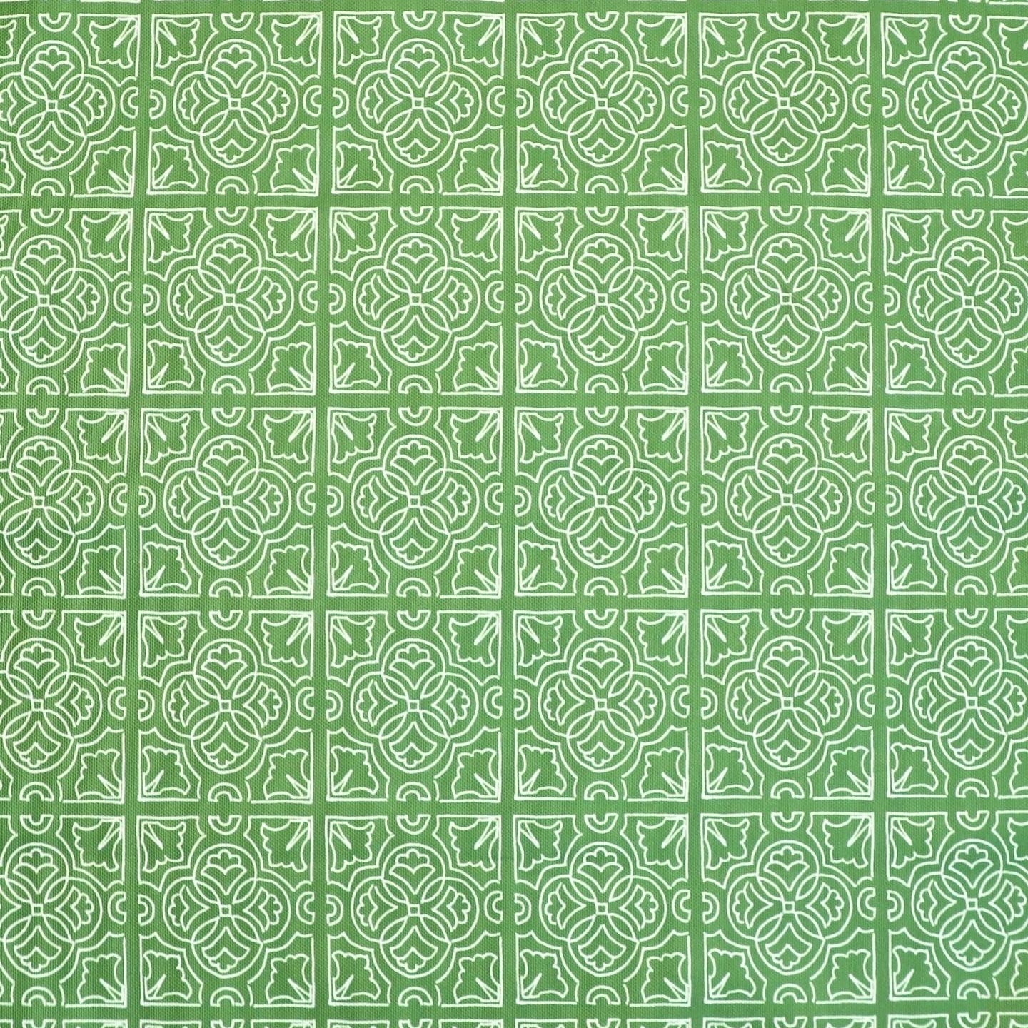 Detail of fabric in a damask lattice print in white on a green field.