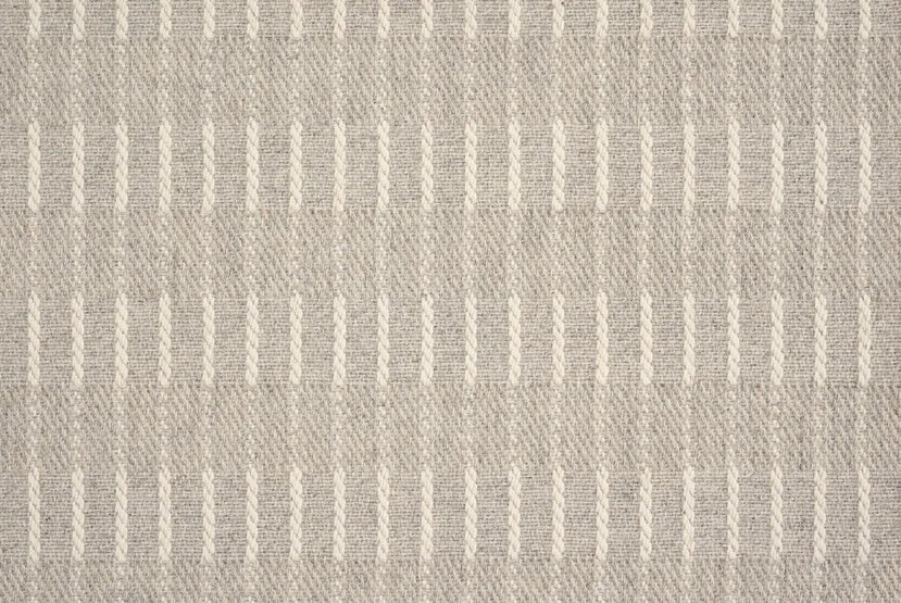 Broadloom carpet sample with a textural stripe in ivory on grey.