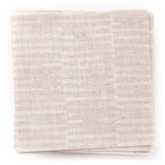 A stack of fabric swatches in a small-scale checked pattern in shades of cream.