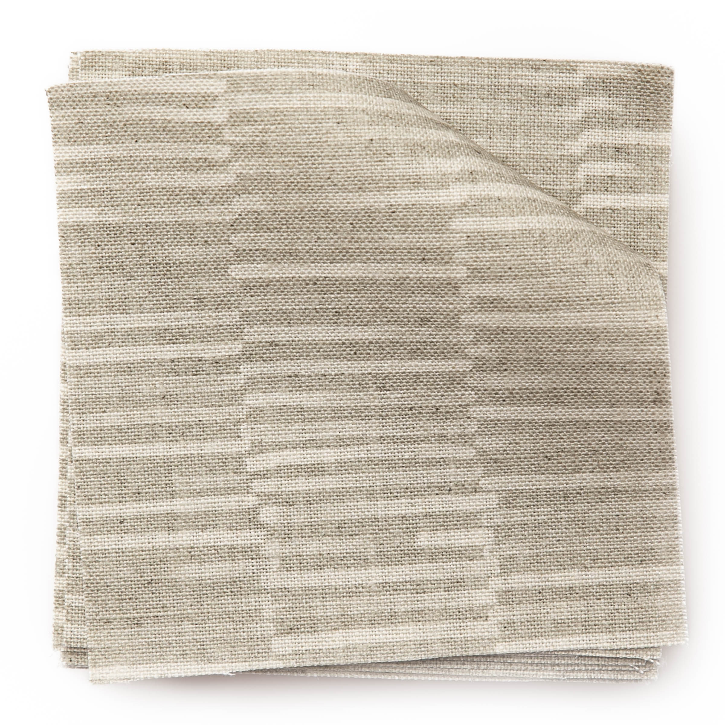 A stack of fabric swatches in a small-scale checked pattern in shades of gray and cream.