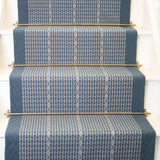 Striped with diamond flatweave runner in blue on white staircase