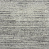 Handknotted rug sample in a textural blend of soft heathered grey and white. 