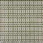 Handowoven rug sampe in a raised geometric pattern in white on a green field. 