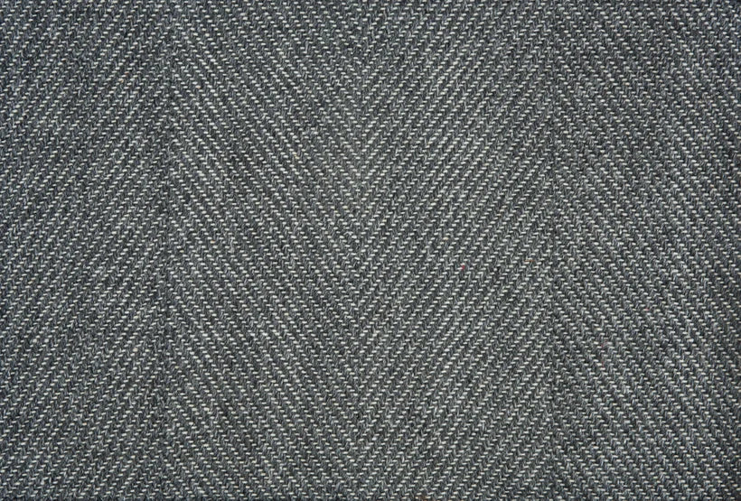 Broadloom carpet swatch in a textural pattern in a dark grey design