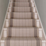 Striped flatweave runner in light grey an brown on white staircase