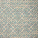 Textile pattern with geometric design in shades of blue.