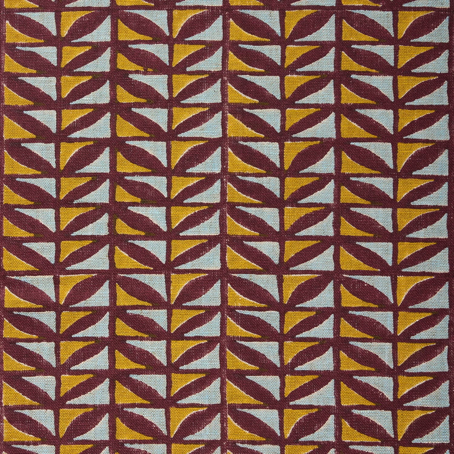 Patterned fabric with geometric design in purple, yellow, and blue.
