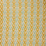 Textile pattern with yellow and green design on a fabric background