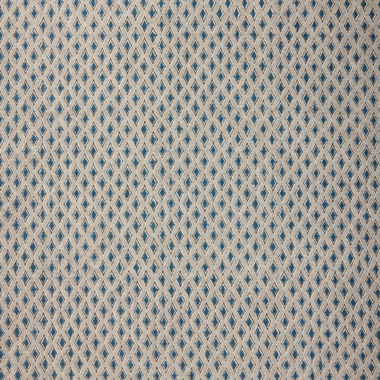 Textile pattern with blue and beige diamonds on a textured background
