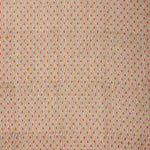 Textile pattern with small diamond shapes in red on a beige background