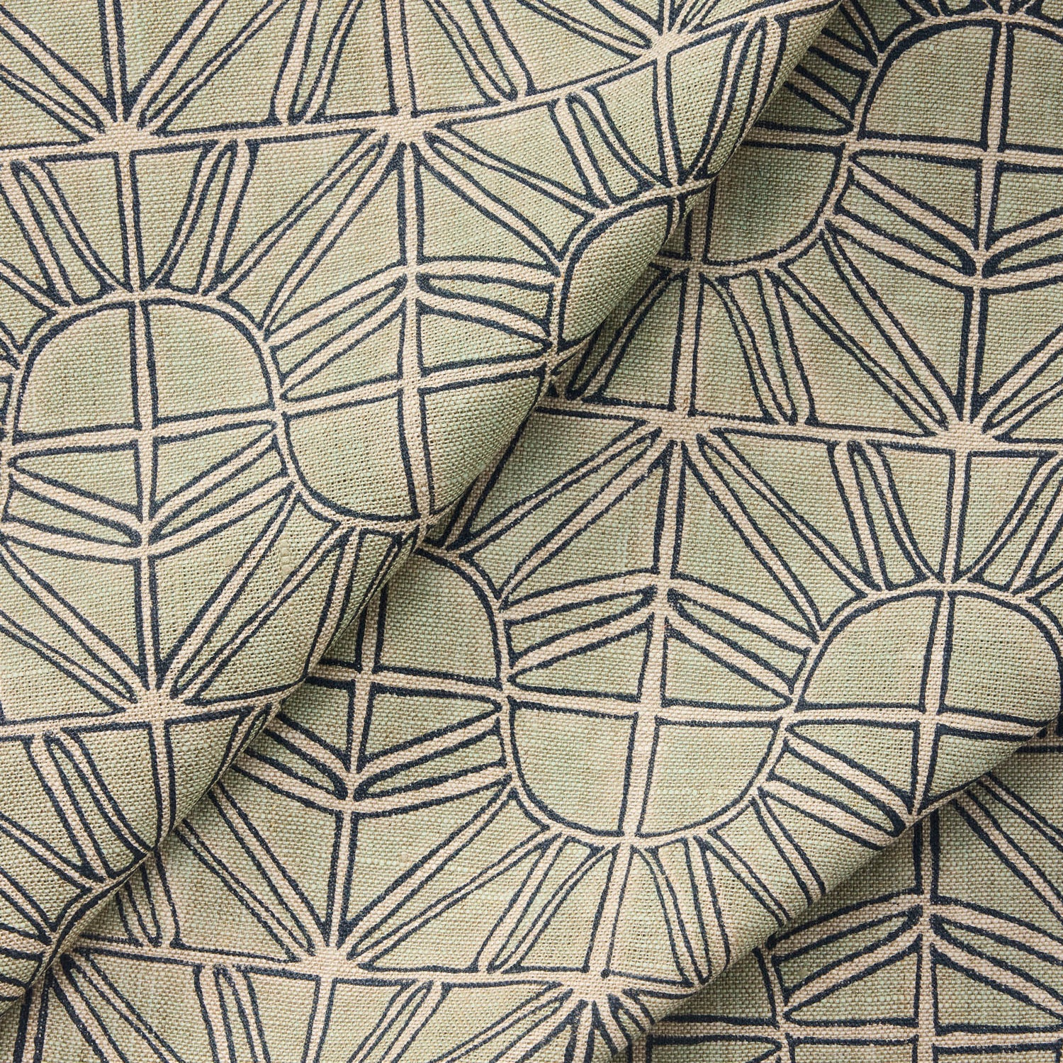 Draped fabric with geometric sun pattern  in light blue with navy blue outline