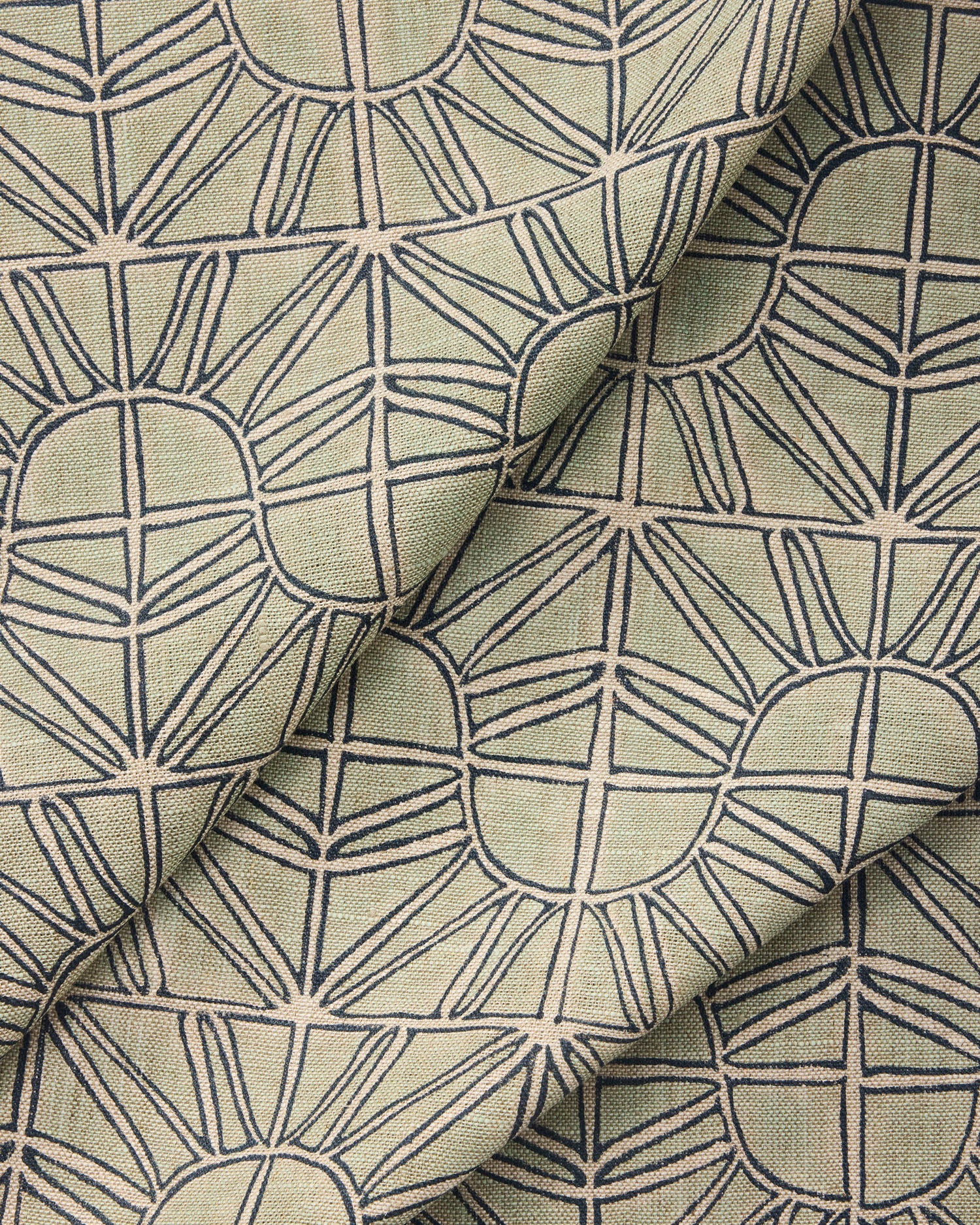 Draped fabric with geometric sun pattern  in light blue with navy blue outline