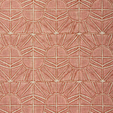 Fabric with geometric sun pattern in clay pink and rust red.