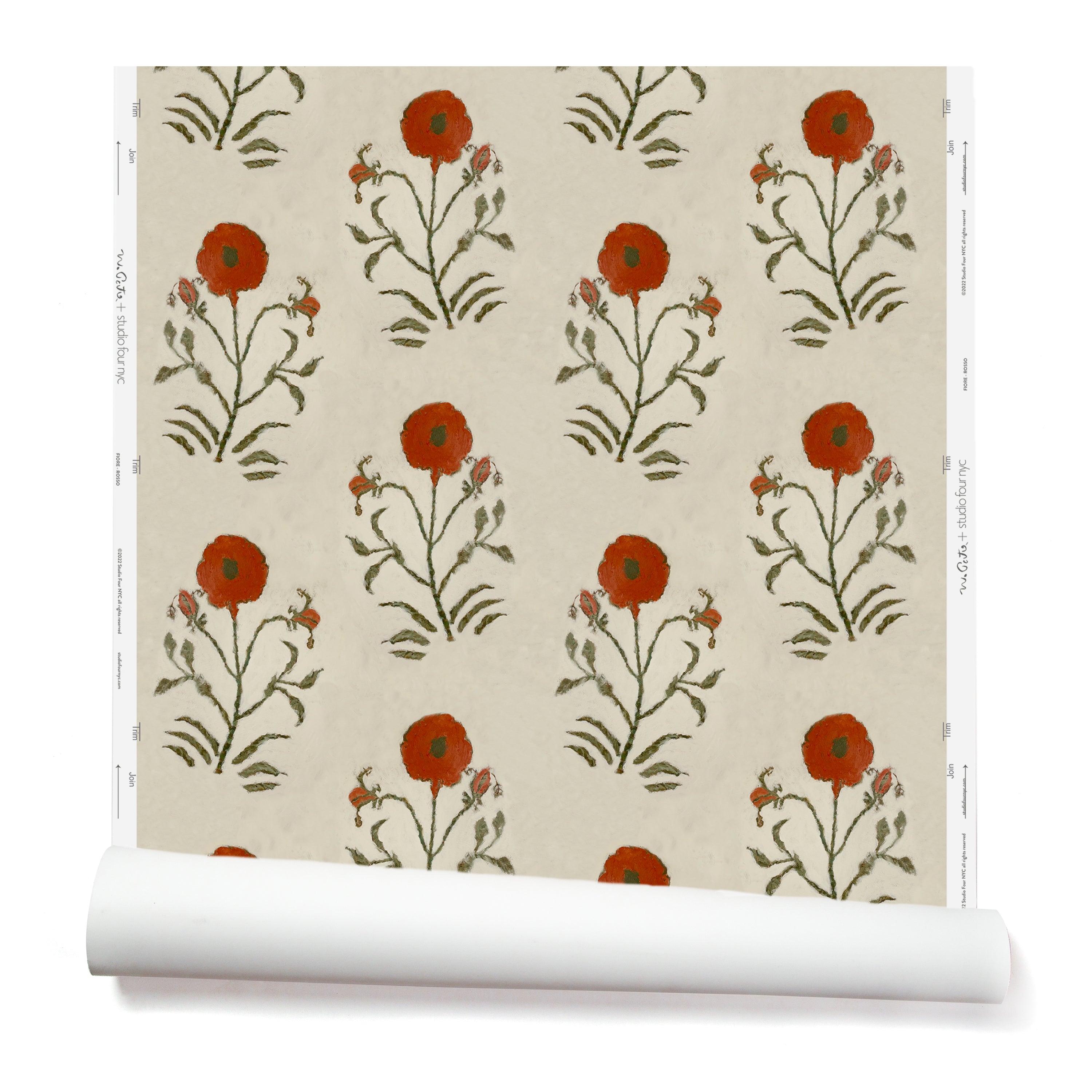 Partially unrolled wallpaper in a large-scale painterly floral print in red and green on a cream field.