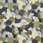 Woven fabric swatch in a painterly geometric pattern in shades of blue, cream and olive.