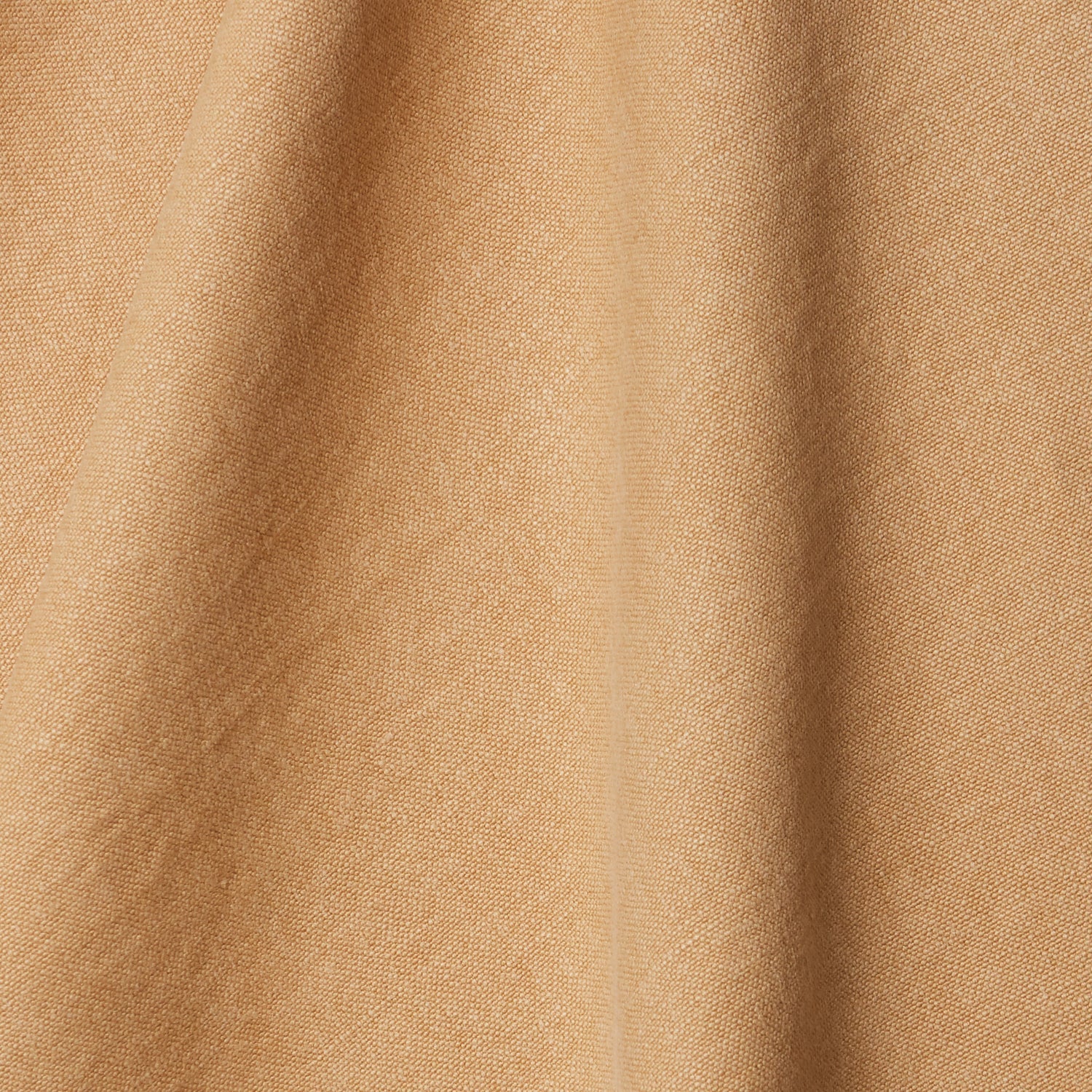 A draped swatch of linen fabric in a solid tan color.