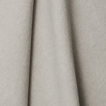A draped swatch of linen fabric in a solid light gray color.