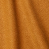 A draped swatch of linen fabric in a solid gold color.