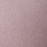A swatch of linen fabric in a solid mauve color.