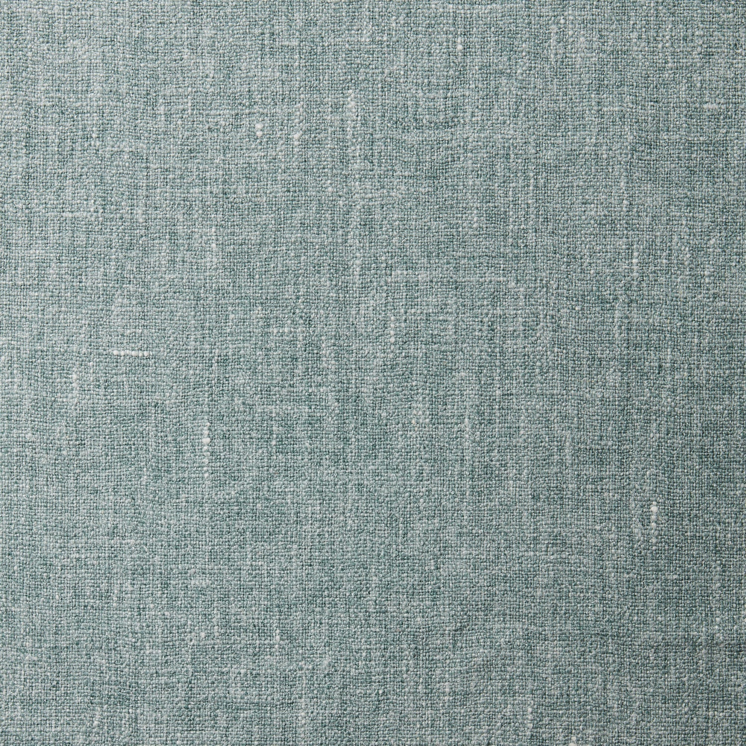 A swatch of blended linen fabric in a mottled light jade color.
