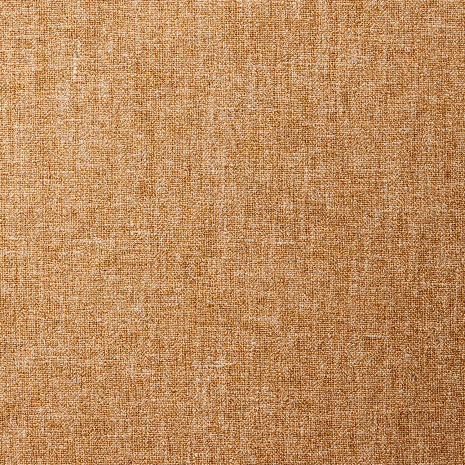 A swatch of blended linen fabric in a mottled mustard color.