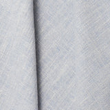 A draped swatch of blended linen fabric in a mottled light blue color.