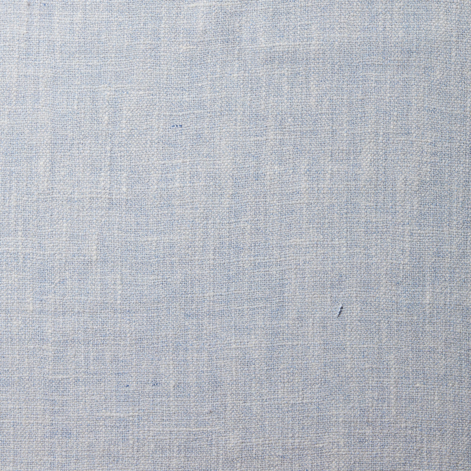 A swatch of blended linen fabric in a mottled light blue color.