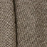 A draped swatch of linen fabric with a small-scale pattern of diagonal stripes in dark brown and tan.