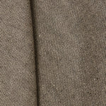 A draped swatch of linen fabric with a small-scale pattern of diagonal stripes in dark brown and tan.