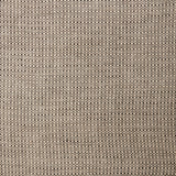 A swatch of linen fabric in a small-scale dotted pattern in tan and dark brown.