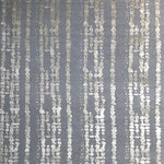 Handknotted rug in a bold painterly design in taupe and grey. 