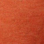 A swatch of blended linen-wool mix fabric in a flecked red color.