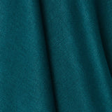 A draped swatch of blended linen fabric in a solid turquoise color.