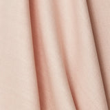 A draped swatch of blended linen fabric in a solid pale pink color.