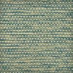 Detail of a handowven rug with a textural strié pattern in shades of green