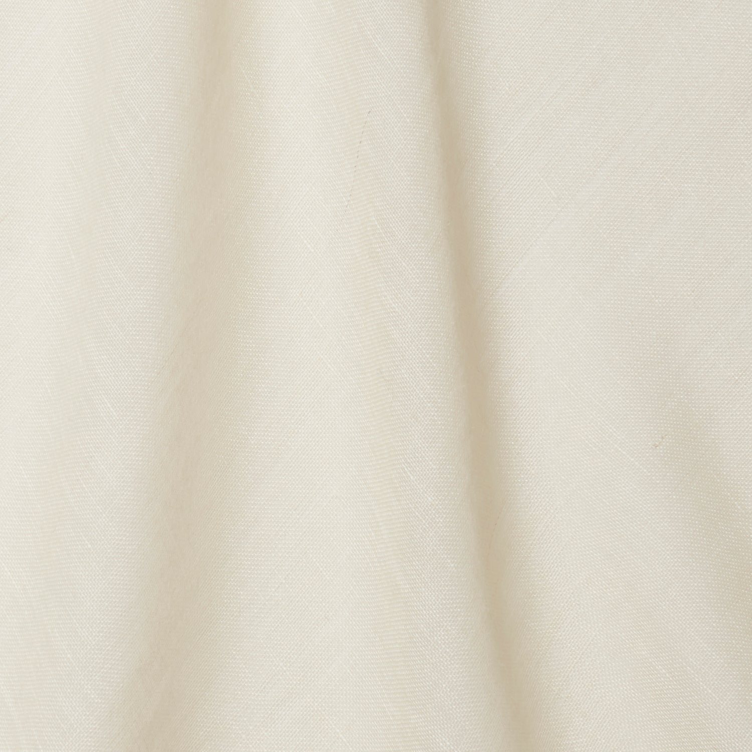 A draped swatch of open-weave sheer interior fabric in a mottled cream color.