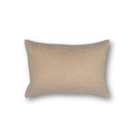 Handwoven pillow in a subtle geometric design in peach and cream