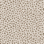 Detail of fabric in a painterly animal print in brown and gray on a cream field.